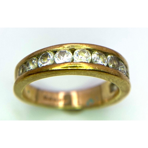 397 - A 9K Yellow Gold and White Stone Half-Eternity Ring. Size N. 3.68g total weight.