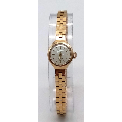 411 - An Accurist 21 Jewel 9K Gold Ladies Watch. 9K gold bracelet and case - 15mm. White dial. Mechanical ... 