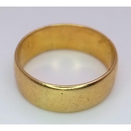 302 - An 18K Yellow Gold (tested) Band Ring. 6mm width.  Size L. 4.3g weight.