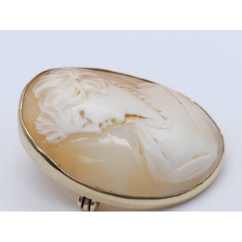 483 - A Vintage 9K Yellow Gold Cameo Brooch. 3cm. 5.46g total weight.