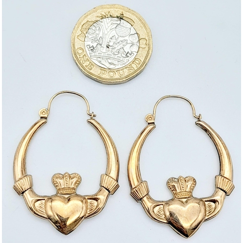 467 - A Pair of Vintage 9K Yellow Gold Claddagh Creole Earrings. 3.5cm drop. 2.66g total weight.