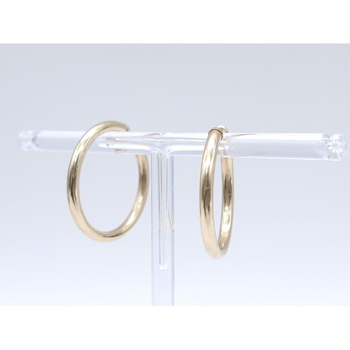 446 - A Pair of Classic 9K (tested) Yellow Gold Hoop Earrings. 1.65g total weight.