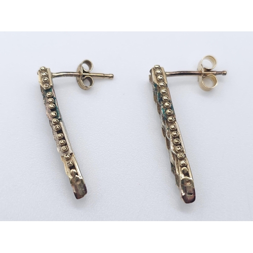 452 - A Pair of 9K Tri-Colour Gold Dagger-Drop Earrings. 2.37g total weight. 22mm drop