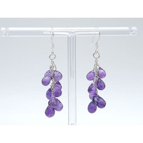 604B - A collection of Amethyst gemstone Jewellery.
Featuring a beaded necklace (44cm) with a 925 Silver cl... 