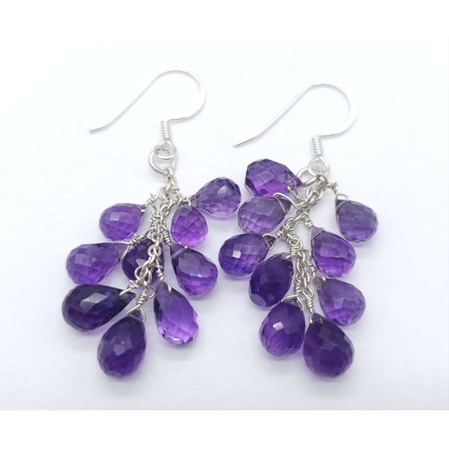 604B - A collection of Amethyst gemstone Jewellery.
Featuring a beaded necklace (44cm) with a 925 Silver cl... 