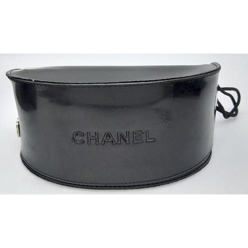 277 - A Pair of Chanel Sunglasses. Comes with case and Chanel box. In good condition. Ref: 15400