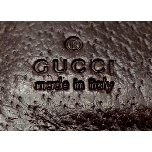 316 - A Gucci Monogram Canvas Wallet. Comes with a Gucci box. 10cm x 9cm. Ref: 15399