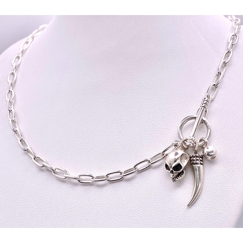 783 - A Very Unique Sterling Silver Skull and Claw T-Bar Necklace. 46cm Length. Gross Weight 21.63 Grams.