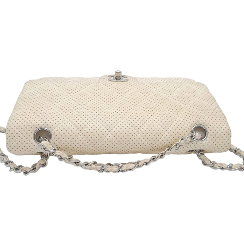 79 - A Chanel Quilted White Lambskin Shoulder Flap Bag. White perforated quilted caviar leather exterior ... 