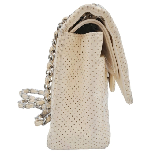 79 - A Chanel Quilted White Lambskin Shoulder Flap Bag. White perforated quilted caviar leather exterior ... 