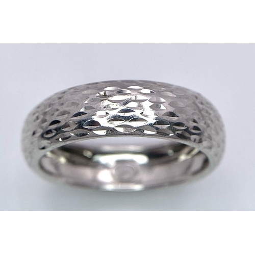 854 - A parcel of Sterling Silver Jewellery.
Includes two rings (both Size N), a bracelet (19.5cm) and a h... 