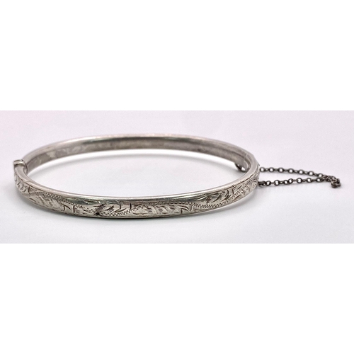 854 - A parcel of Sterling Silver Jewellery.
Includes two rings (both Size N), a bracelet (19.5cm) and a h... 