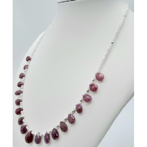 624B - A stunning collection of matching Ruby & Moonstone, Sterling Silver Jewellery.
Featuring a beautiful... 