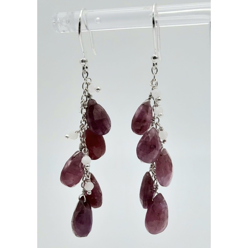 624B - A stunning collection of matching Ruby & Moonstone, Sterling Silver Jewellery.
Featuring a beautiful... 