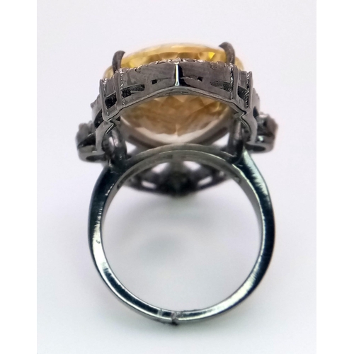 618B - An exquisite 24ct Citrine stone, framed by 1.10ctw of Diamonds and set on a 925 Sterling Silver.
Wei... 