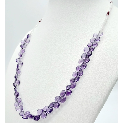 721B - A playful Amethyst & Moonstone Beaded Necklace, with a 925 Silver clasp. With 65cts of Amethyst, thi... 