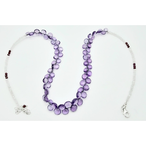 721B - A playful Amethyst & Moonstone Beaded Necklace, with a 925 Silver clasp. With 65cts of Amethyst, thi... 