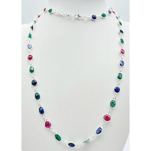 707B - A playful Ruby, Emerald & Sapphire gemstone, long chain Sterling Silver necklace.
These delightful n... 