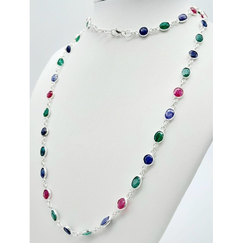 707B - A playful Ruby, Emerald & Sapphire gemstone, long chain Sterling Silver necklace.
These delightful n... 