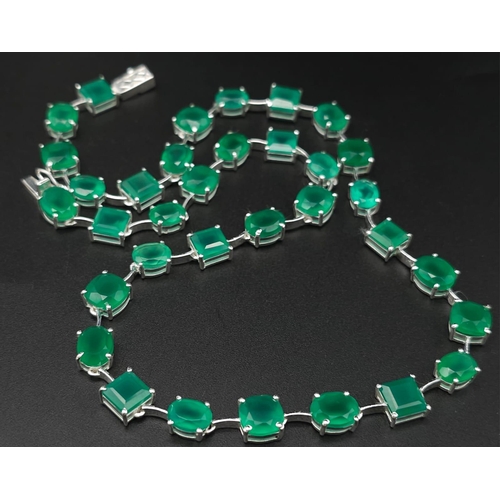 762B - A gleaming Emerald gemstone, Sterling Silver, Tennis Necklace. Measures 42cm in length and weighs 32... 