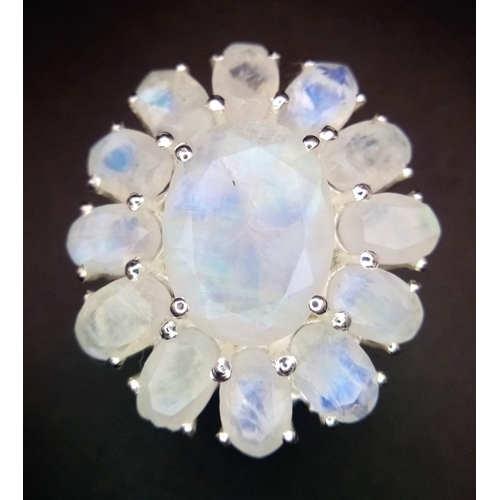 763B - An iridescent Moonstone, Sterling Silver Cocktail Ring.
Wonderful floral design that shimmers and gl... 