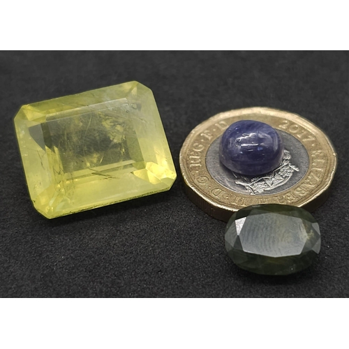 769B - Three Certificated Gemstones: 4.63ct blue tanzanite cabochon, a Madagascan 29.4ct lemon quartz and a... 