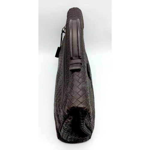 612 - A Bottega Veneta Black Leather Briefcase. Leather intrecciato weave exterior with a large zipped com... 