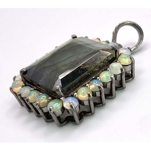 701B - A Labradorite & Opal 925 Silver Pendant. Rectangular step cut Labradorite with an opal halo. Labrado... 