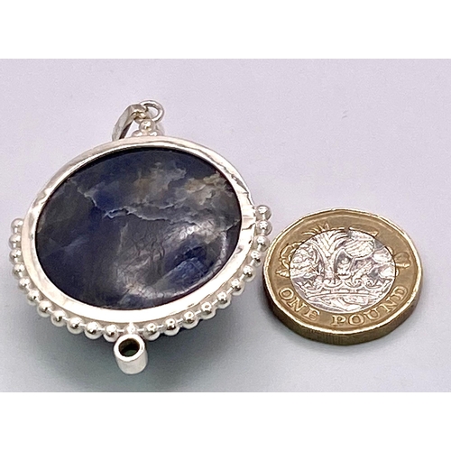 716B - A 166.5ct Huge Blue Sapphire Cabochon 925 Silver Pendant. 66.55ct. W- 42g. 5.5cm. Comes with a prese... 