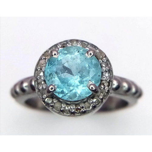 729B - A Blue Topaz and Rose Cut Diamond 925 Sterling Silver Ring. Blue Topaz- 1.50ct. Diamonds- 0.22ctw. S... 