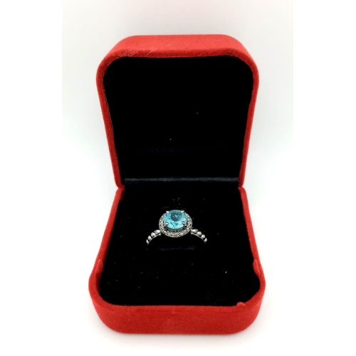 729B - A Blue Topaz and Rose Cut Diamond 925 Sterling Silver Ring. Blue Topaz- 1.50ct. Diamonds- 0.22ctw. S... 