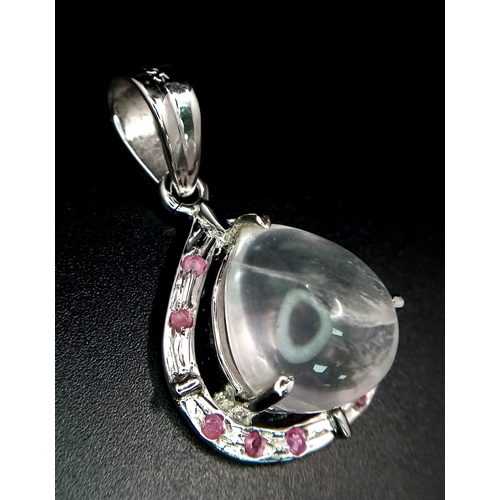 641B - A Rose Quartz 925 Silver Pendant. Teardrop shape. W-9.1g. 4cm. 9.11 total weight. Comes with a prese... 