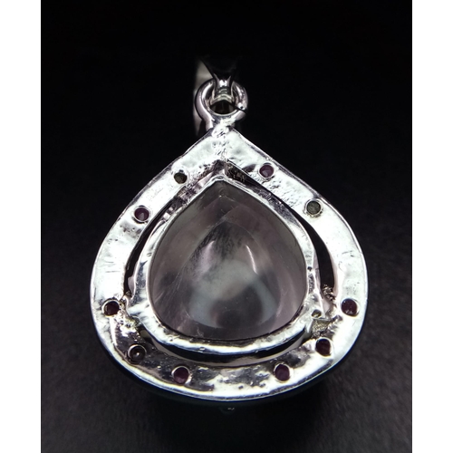 641B - A Rose Quartz 925 Silver Pendant. Teardrop shape. W-9.1g. 4cm. 9.11 total weight. Comes with a prese... 