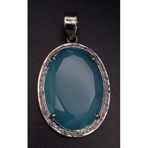 670B - An 18.5CT Oval shape Chalcedony with 0.25CT Rose cut Diamonds set in a 925 silver pendant. Total wei... 