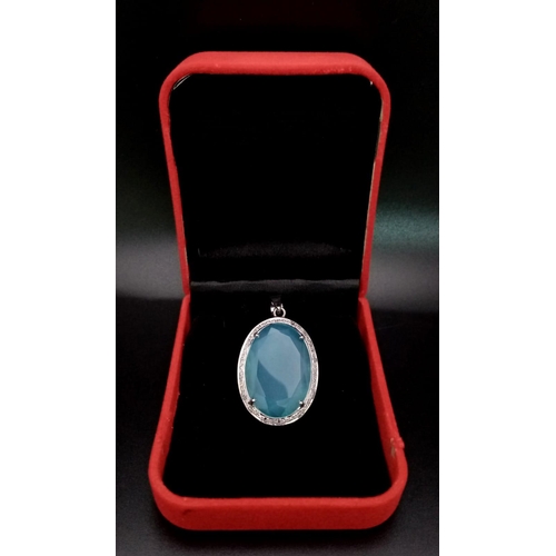 670B - An 18.5CT Oval shape Chalcedony with 0.25CT Rose cut Diamonds set in a 925 silver pendant. Total wei... 