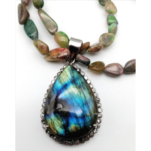 684B - An Irregular Shaped Opal Beaded Necklace with a Rose cut Diamond and Opal Clasp - With a 29ct Labrad... 