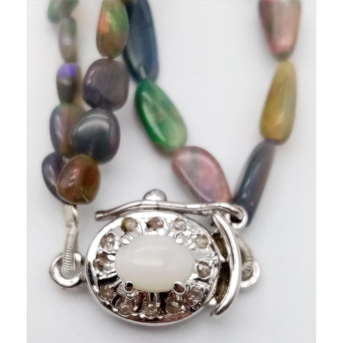 684B - An Irregular Shaped Opal Beaded Necklace with a Rose cut Diamond and Opal Clasp - With a 29ct Labrad... 