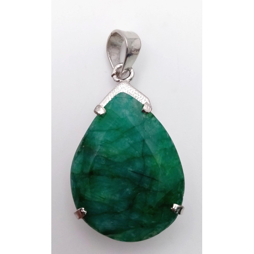 751B - A Large Emerald Pear-Shape 925 Silver Pendant. 65ct. 5.5cm. 19g total weight. Comes with a presentat... 