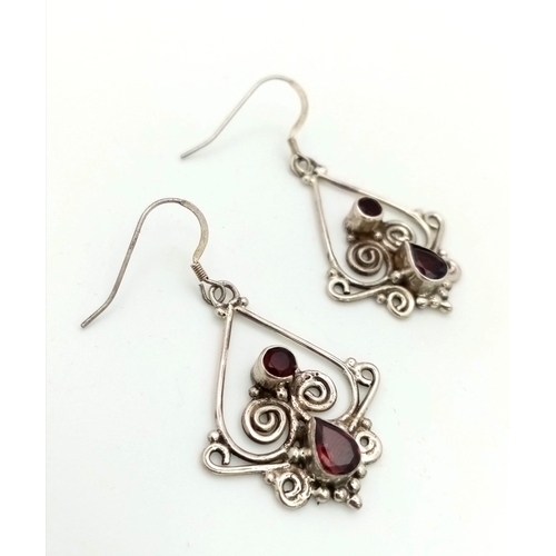 743B - A Pair of 925 Silver and Garnet Art Deco Style Earrings. Comes with a presentation case.