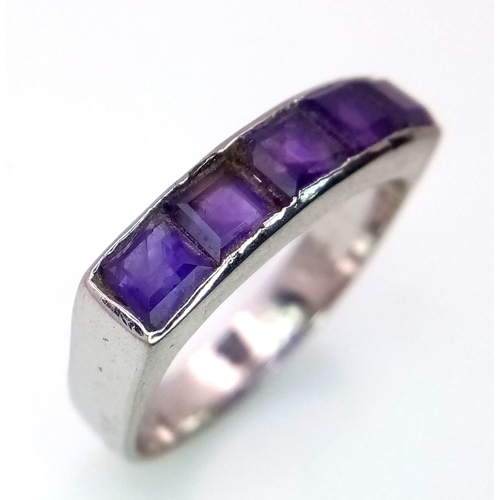 736B - A Designer Amethyst Ring set in 925 Sterling Silver. 
Size R. 4g total weight. Comes with a presenta... 