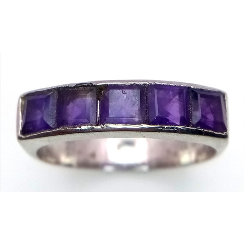 736B - A Designer Amethyst Ring set in 925 Sterling Silver. 
Size R. 4g total weight. Comes with a presenta... 