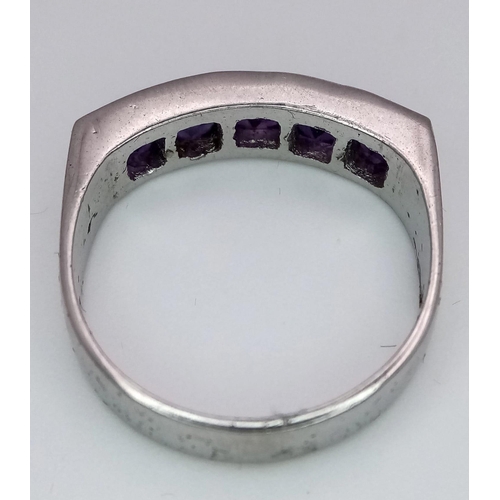 736B - A Designer Amethyst Ring set in 925 Sterling Silver. 
Size R. 4g total weight. Comes with a presenta... 