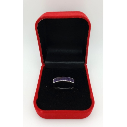 736B - A Designer Amethyst Ring set in 925 Sterling Silver. 
Size R. 4g total weight. Comes with a presenta... 