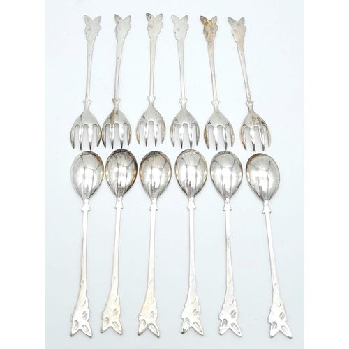 646B - Parcel of antique silver cutlery.
Featuring six ornately handled spoons and six forks.
Stamped with ... 