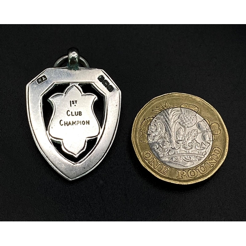 673B - A 1929 Sterling Silver Watch Fob Ornament with Gold Plate Centre. Birmingham hallmarks.