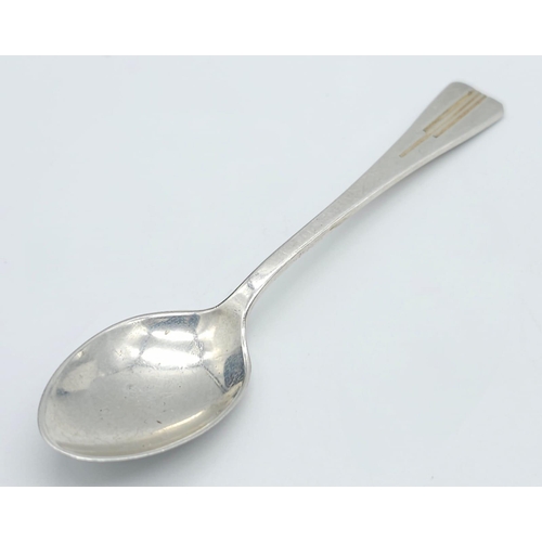 946B - An Antique sterling silver sugar spoon with Full Birmingham hallmarks, 1940 plus a cake knife with f... 