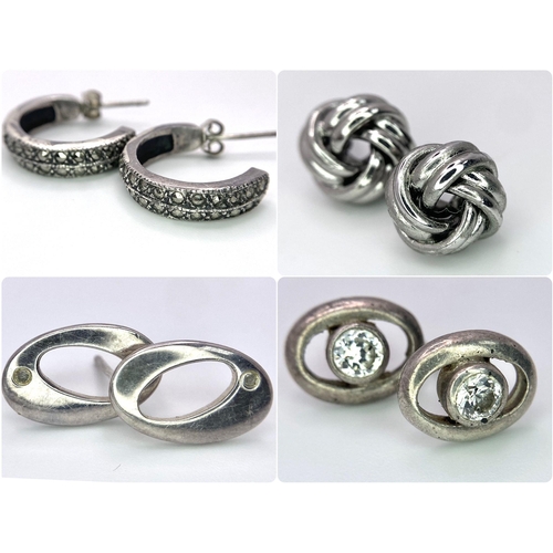 949B - A collection of 3 pairs of 925 silver stud earrings and a pair of silver hoop earrings. Total weight... 