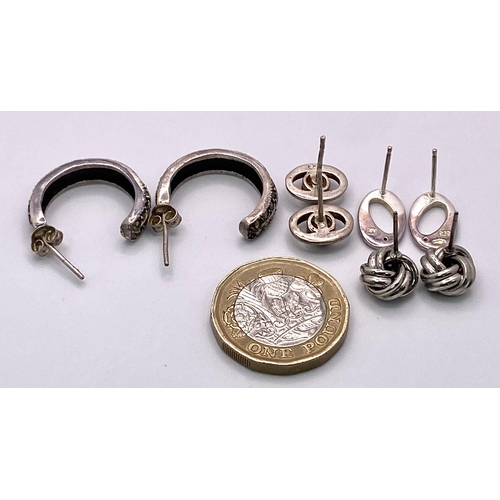 949B - A collection of 3 pairs of 925 silver stud earrings and a pair of silver hoop earrings. Total weight... 