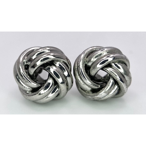 949B - A collection of 3 pairs of 925 silver stud earrings and a pair of silver hoop earrings. Total weight... 