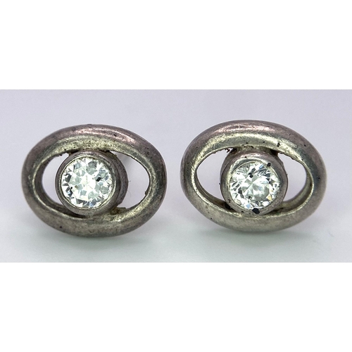 949B - A collection of 3 pairs of 925 silver stud earrings and a pair of silver hoop earrings. Total weight... 